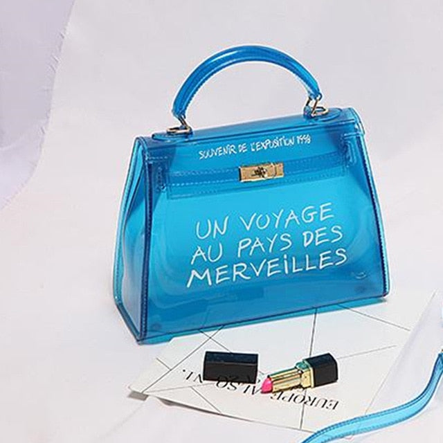 Clear Transparent PVC Shoulder Bags Un Voyage au Pays des Merveilles Emporium Discounts come in 5 different colours Brown, red, green, blue, orange