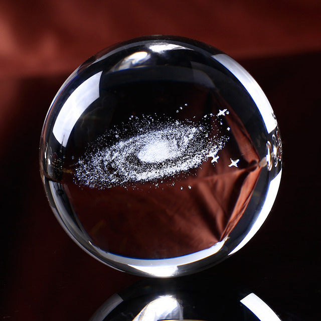 This 3D Galaxy Miniature Crystal Ball is just what you need to add a touch of elegance and class to your home décor. It is made of high-quality K9 crystal that makes it durable and long lasting. The beautiful transparency of the crystal ball gives it a magnificent look that is sure to grab everyone's attention.