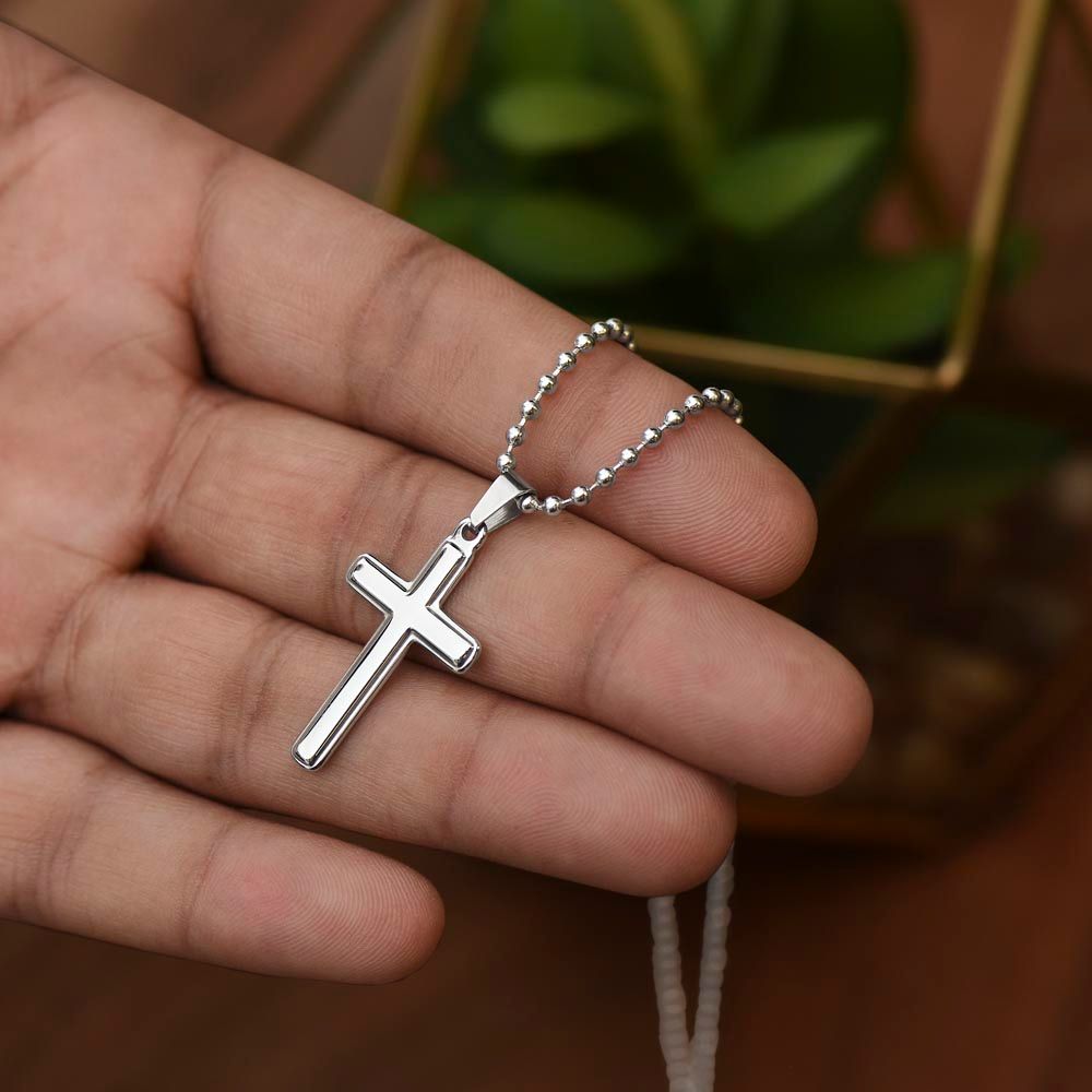 Our Stainless Cross Necklace is a wonderful gift for Father's Day. Imagine the look on their face when they open up this thoughtful gift!  The artisan-crafted detail makes this pendant stand out from other cross necklaces. Includes a ball chain and attaches with an easy-to-use lobster clasp.