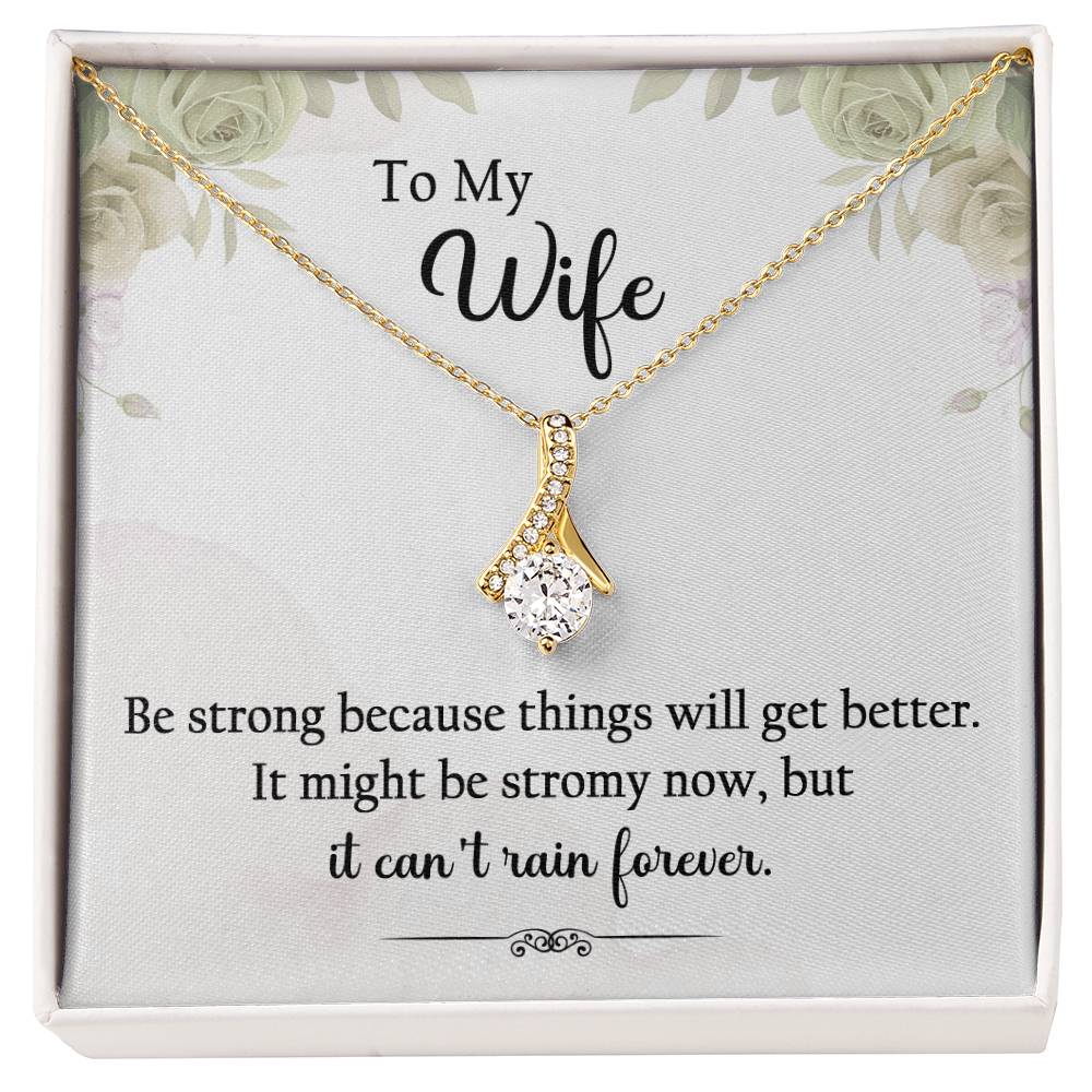 "To My Wife, Be strong because things will get better. It might be stormy now, but it can't rain forever." Alluring Beauty necklace, 14k white gold finish or 18k yellow gold finish over stainless steel. Shop now at Emporium Discounts A luxurious, yet affordable way to show your style. Enjoy the elegant craftsmanship and lasting quality of this beautiful necklace.