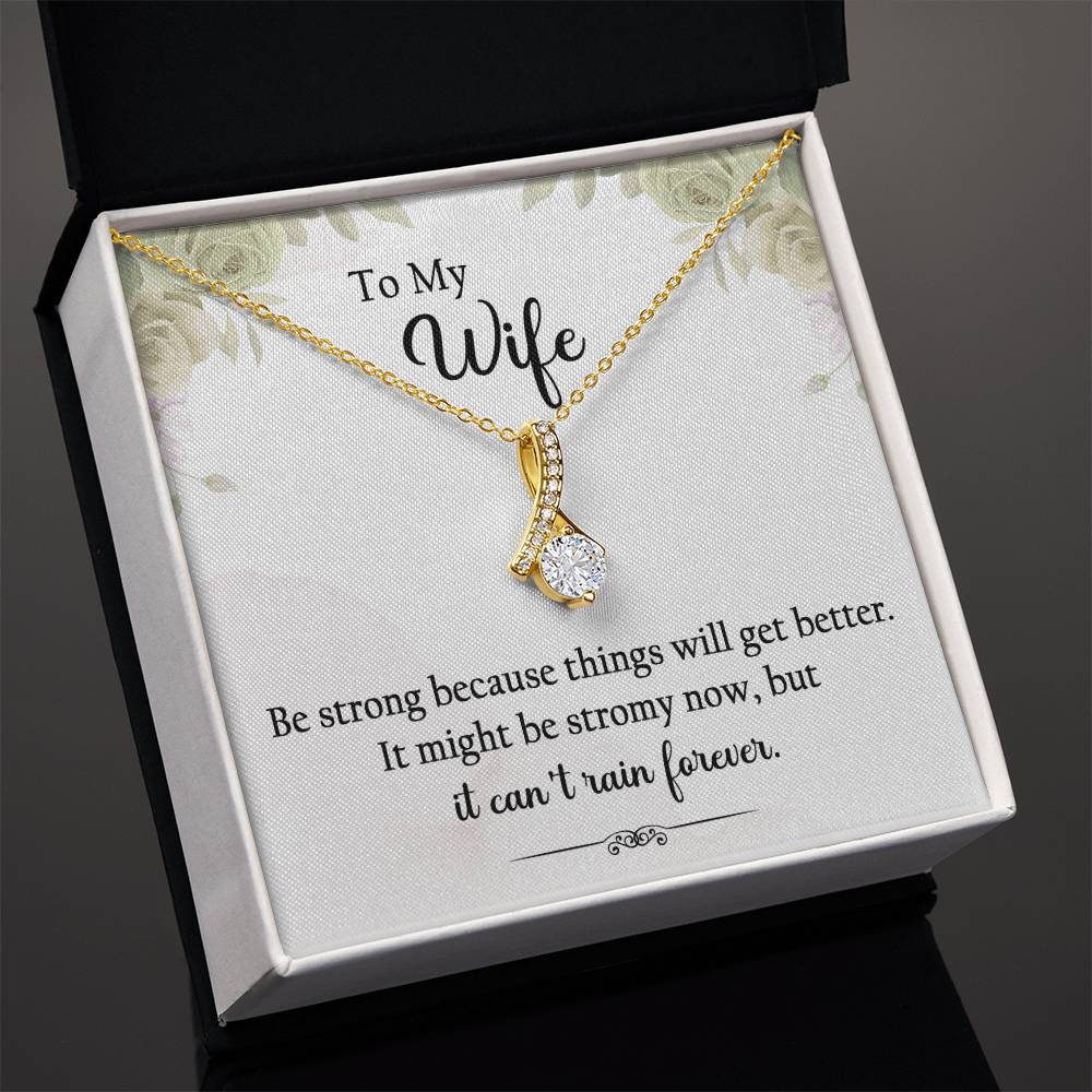 "To My Wife, Be strong because things will get better. It might be stormy now, but it can't rain forever." Alluring Beauty necklace, 14k white gold finish or 18k yellow gold finish over stainless steel. Shop now at Emporium Discounts A luxurious, yet affordable way to show your style. Enjoy the elegant craftsmanship and lasting quality of this beautiful necklace.