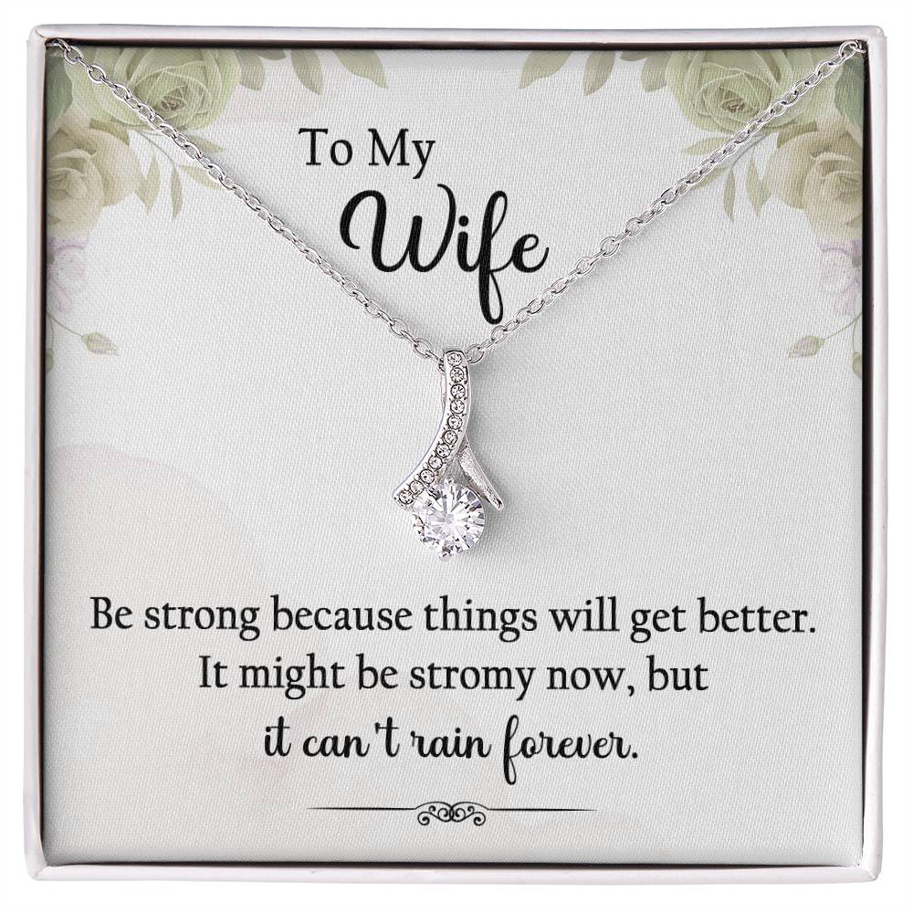 "To My Wife, Be strong because things will get better. It might be stormy now, but it can't rain forever." Alluring Beauty necklace, 14k white gold finish or 18k yellow gold finish over stainless steel. Shop now at Emporium Discounts A luxurious, yet affordable way to show your style. Enjoy the elegant craftsmanship and lasting quality of this beautiful necklace.