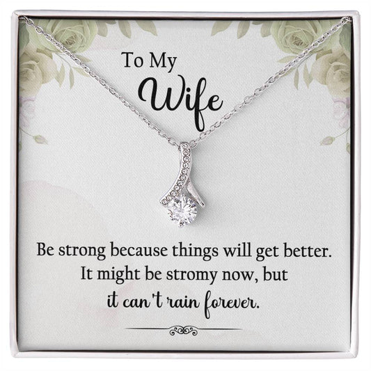 "To My Wife, Be strong because things will get better. It might be stormy now, but it can't rain forever." Alluring Beauty necklace, 14k white gold finish or 18k yellow gold finish over stainless steel. Shop now at Emporium Discounts A luxurious, yet affordable way to show your style. Enjoy the elegant craftsmanship and lasting quality of this beautiful necklace.