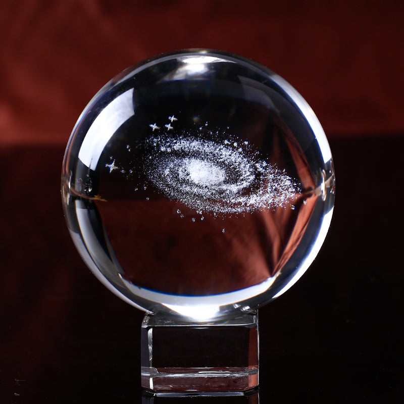 This 3D Galaxy Miniature Crystal Ball is just what you need to add a touch of elegance and class to your home décor. It is made of high-quality K9 crystal that makes it durable and long lasting. The beautiful transparency of the crystal ball gives it a magnificent look that is sure to grab everyone's attention.